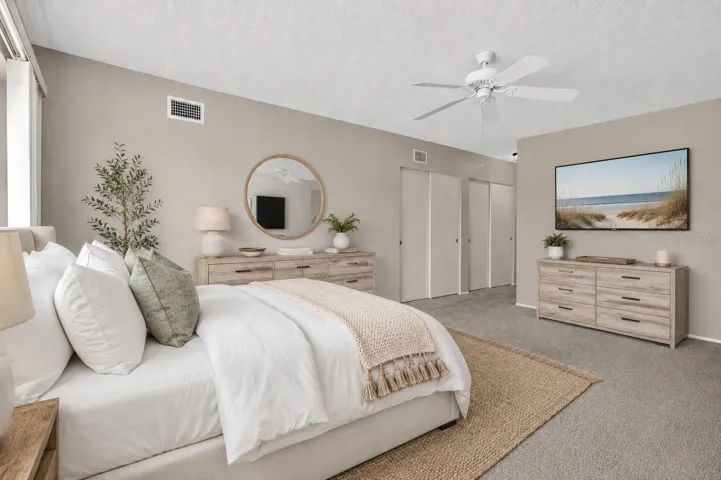 Large primary bedroom with large closets. Virtual stage