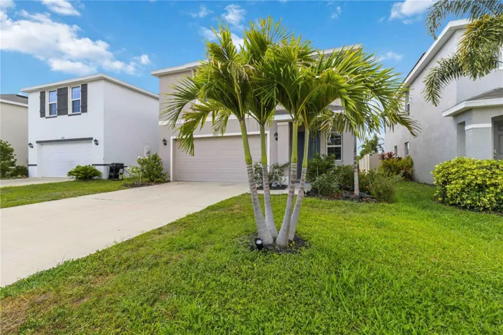 Move-in ready single-family home in Evergreen, Bradenton FL. Standout curb appeal with concrete block construction