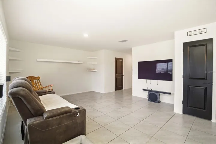 Spacious open concept living room with premium finishes