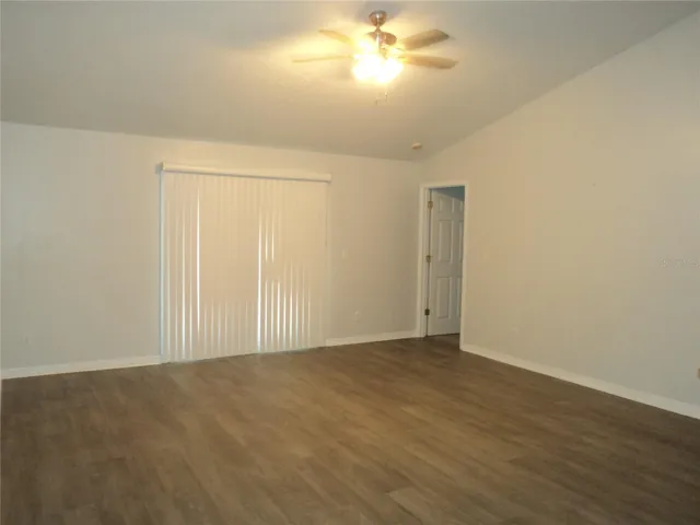 Massive family room with french door entry - blinds closed for privacy