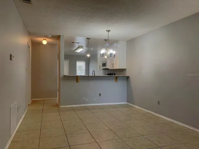 Living Room to Kitchen and back entrance