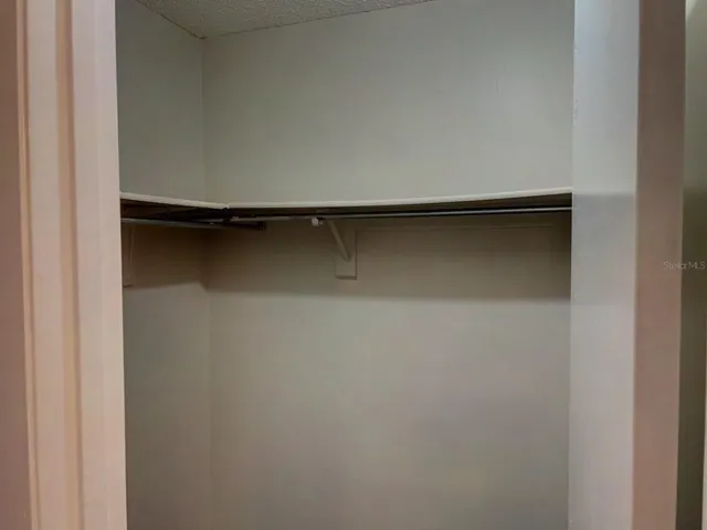 Primary Bedroom Walk in Closet