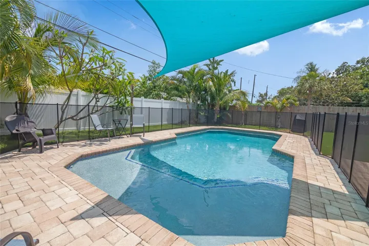 Beautiful heated pool with an optional safety fence around the pool