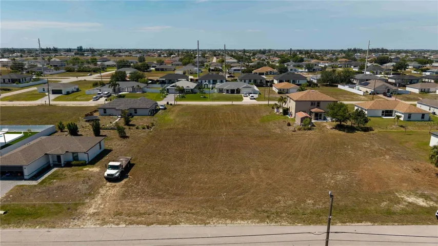 This exceptional RESIDENTIAL VACANT LOT showcases a highly desirable SOUTHERN REAR EXPOSURE, welcoming ABUNDANT NATURAL SUNLIGHT throughout the day while creating the PERFECT SETTING for enjoying SWFL SUNRISES, SUNSETS & YEAR-ROUND OUTDOOR LIVING.