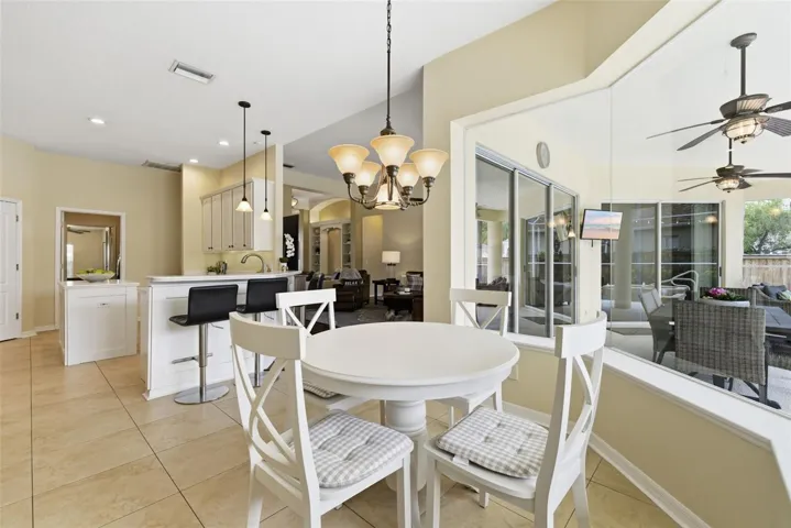 Kitchen dining area with aquarium window
