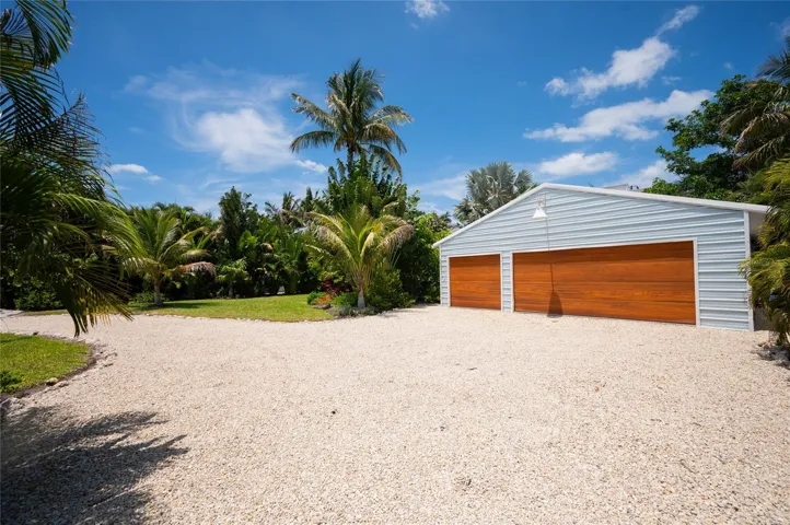 240 Gladiolus is a 10,600+ squ ft lot beautifully landscaped and has a large garage.  Adjacent home at 242 Gladiolus is also available for separate purchase.