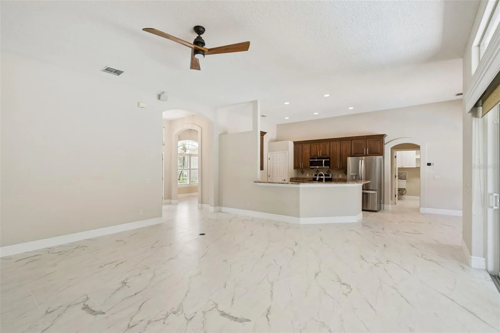 VIEW OF KITCHEN FROM FAMILY ROOM