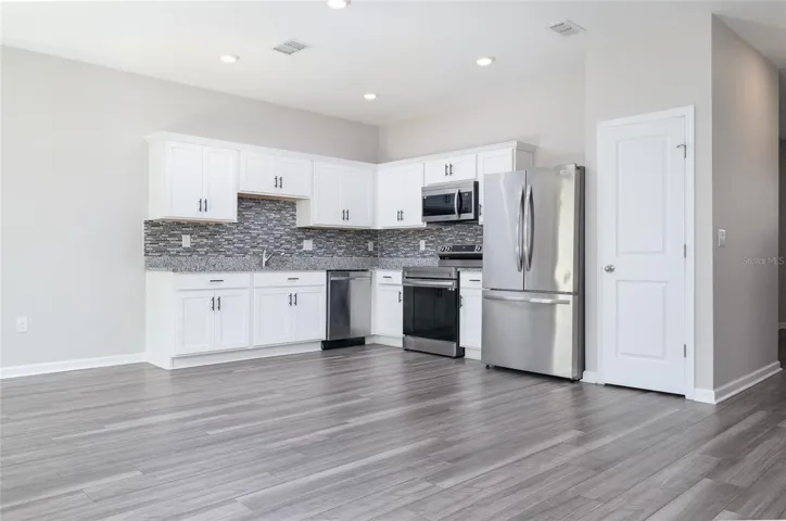 Vinyl Flooring throughout the entire first floor