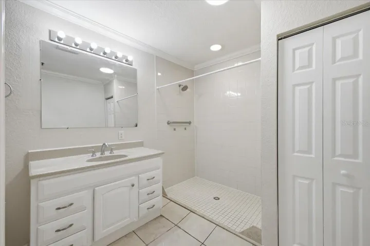 Bath with roll-in shower