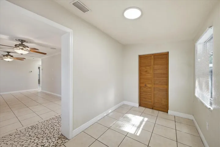 Foyer/Sunroom and Dining Area