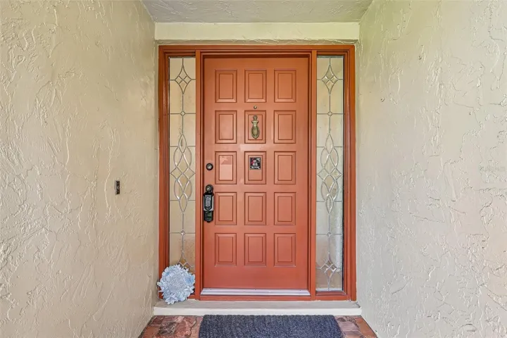 Step inside and immediately appreciate the home's elegant updates, including CALIFORNIA BAMBOO FLOORING throughout, crown molding, recessed lighting, UPDATED WINDOWS AND DOORS, a central vacuum system, and AC replaced in 2019.