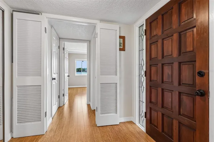 Step inside and immediately appreciate the home's elegant updates, including CALIFORNIA BAMBOO FLOORING throughout, crown molding, recessed lighting, UPDATED WINDOWS AND DOORS, a central vacuum system, and AC replaced in 2019.