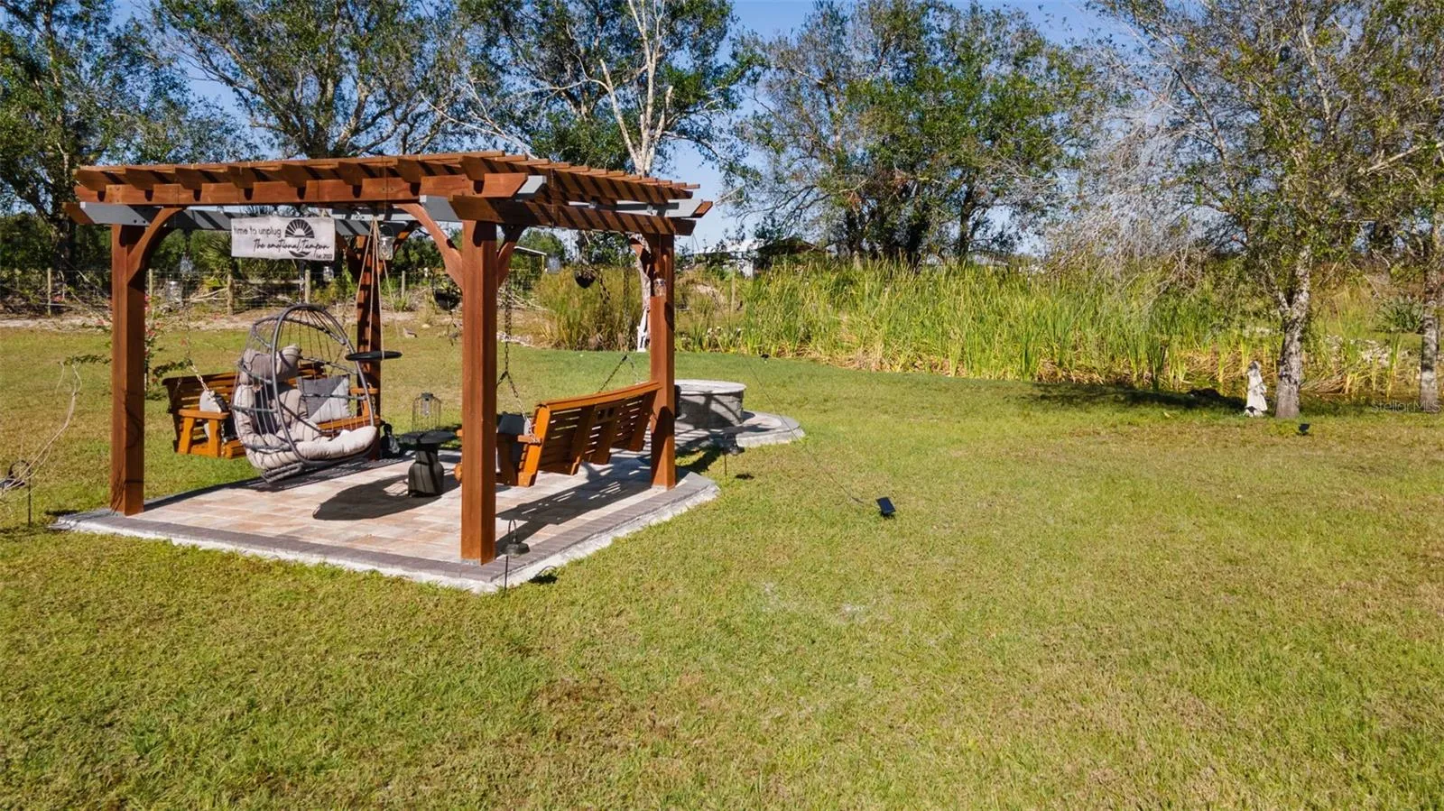 Pergola with swings