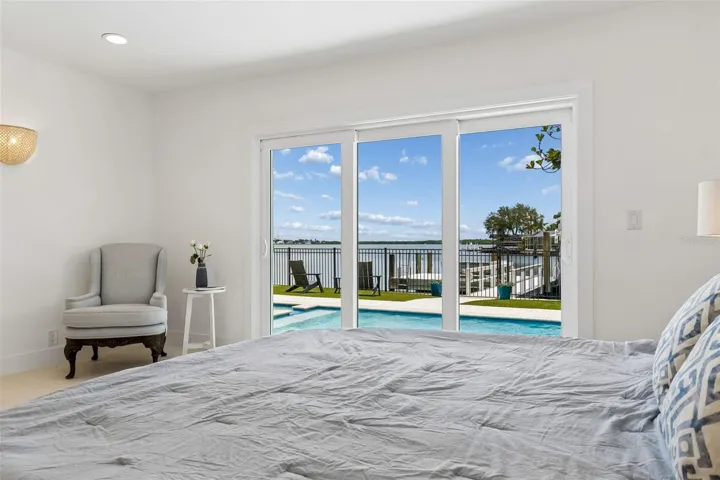 Master Suite water view and shell stone tile