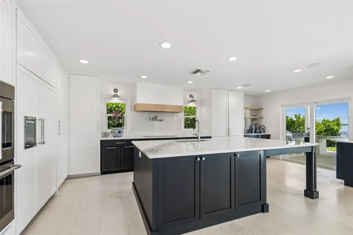 Double Monogram Ovens, Cabinet depth Monogram refrigerator, Induction stove top with pot filler faucet