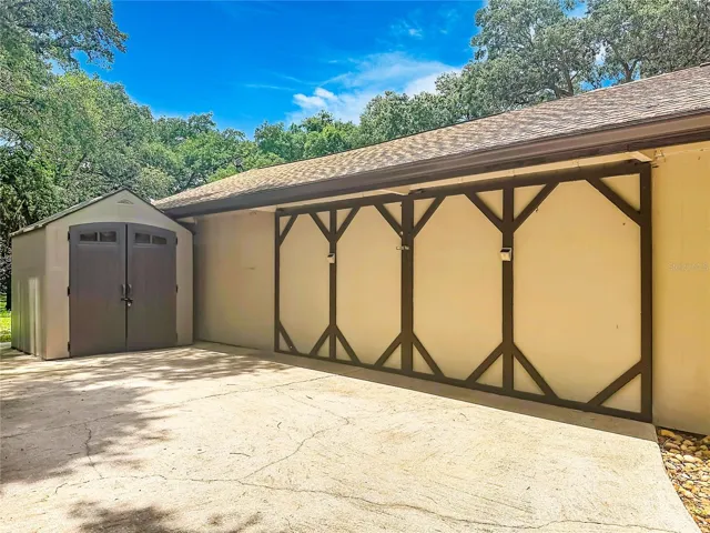 20 x 23 garage with Brand-new A/C, ideal for workshop, storage, or entertainment space.