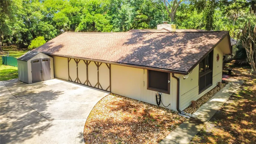 20 x 23 garage with Brand-new A/C, ideal for workshop, storage, or entertainment space.