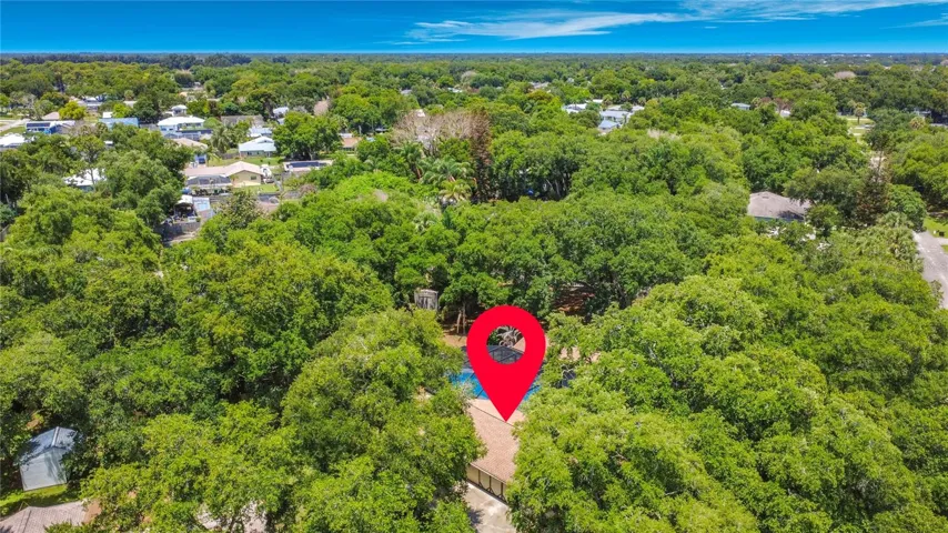 An exceptional 0.93-acre property filled with beauty and charm