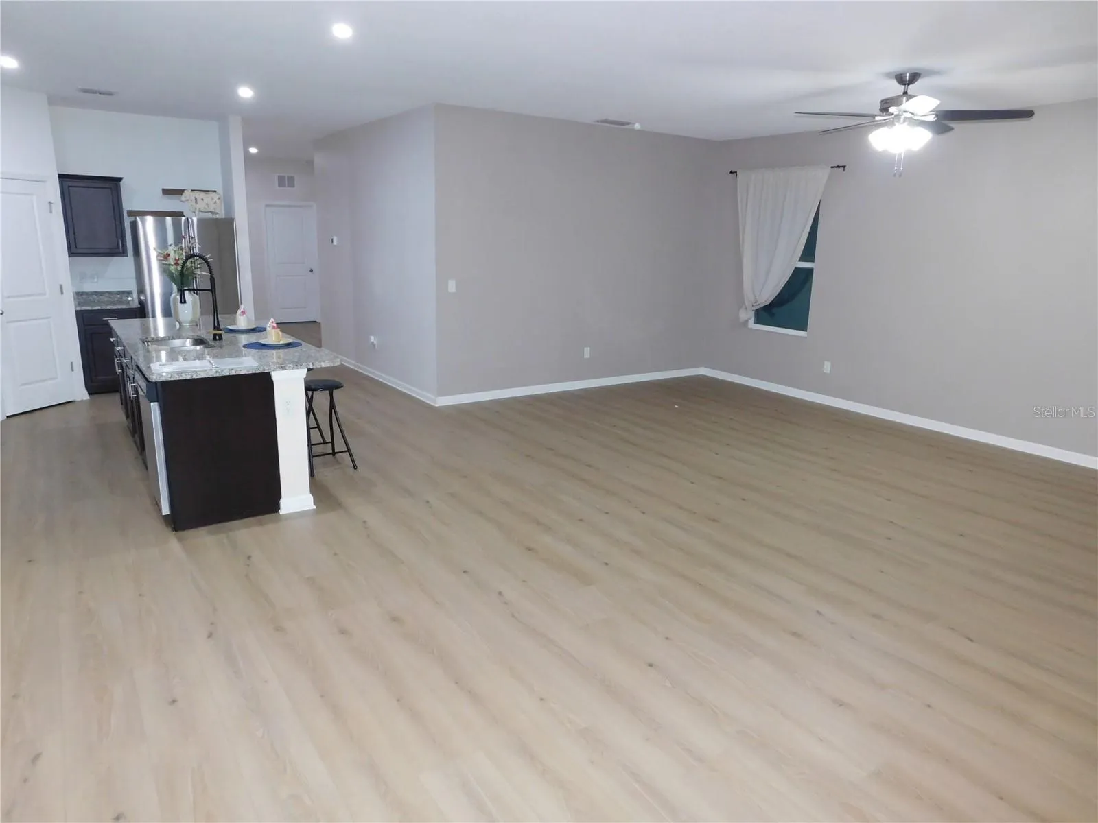 Designer LVP 9X60 throughout living areas ready to greet you!