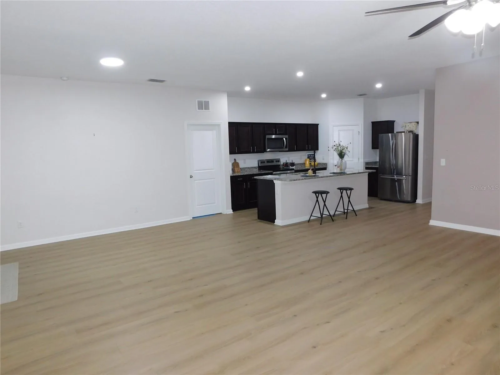 Designer LVP 9X60 throughout living areas ready to greet you!