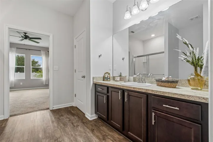 Generous cabinetry and mirror