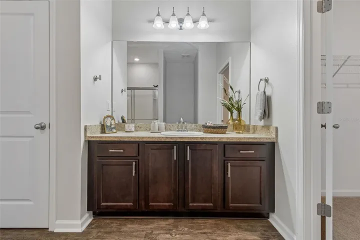 Generous cabinetry and mirror