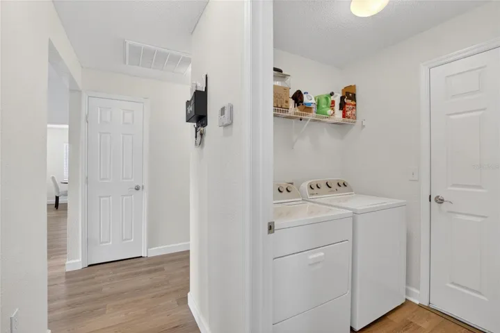 Hallway to Primary and Laundry Room