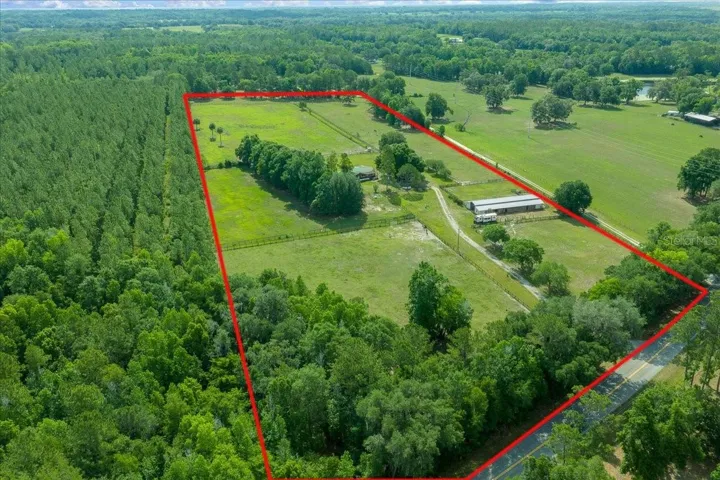 aerial view of property and front of home