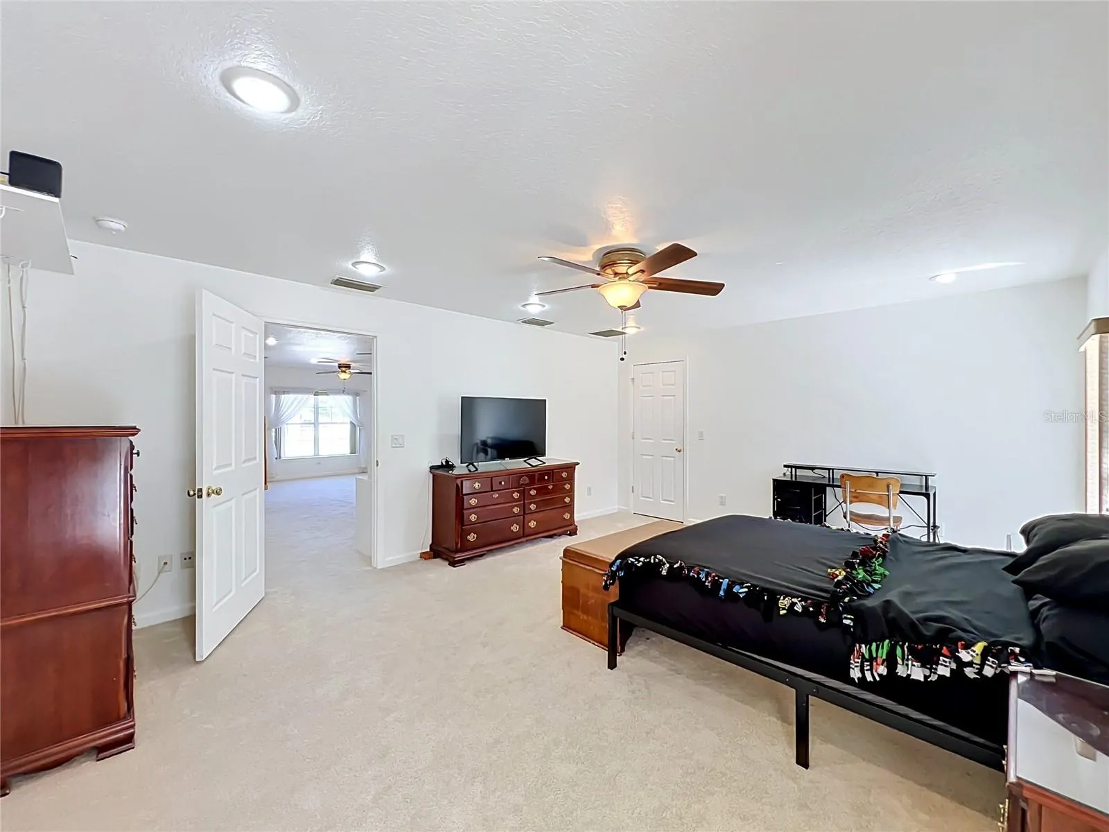 Larger Primary next to Bonus Room/Media Room/Office