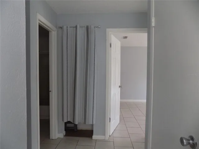 Bedroom next to bathroom
