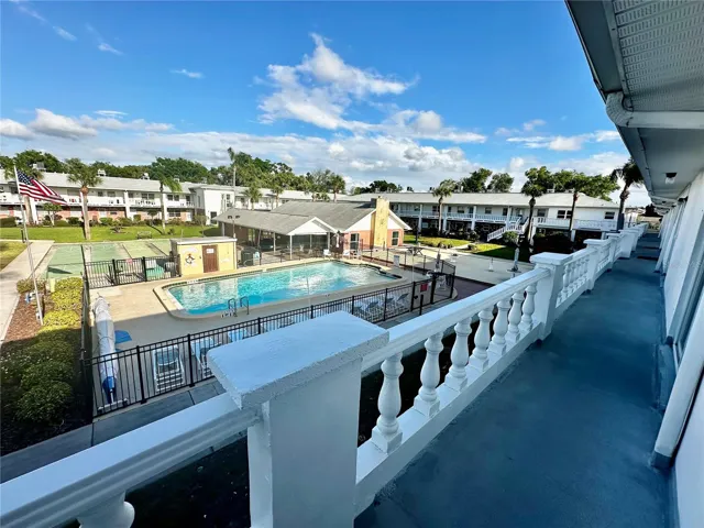 View from Florida Room to Pool Courtyard and Clubhouse
