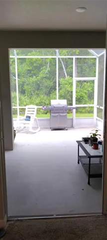 8 Foot Tall Glass doors lead to Covered Lani