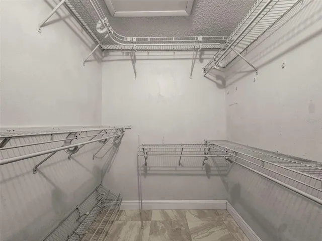 Primary Bedroom Walk in Closet