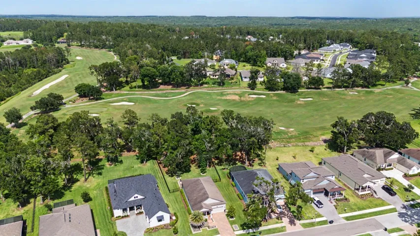 Golf course beyond the fenced backyard for serene views!