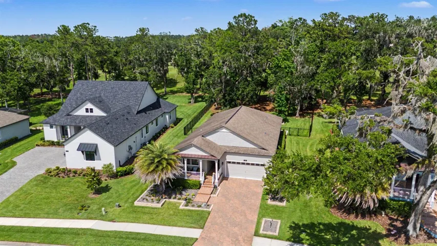 No rear neighbors on this premium landscaped golf course lot!