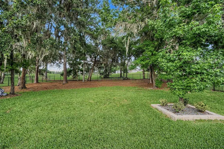 Lush, fenced backyard setting