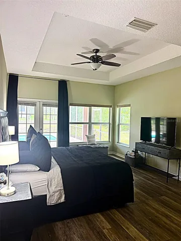 Master Bedroom w/French Doors leading into Pool Area