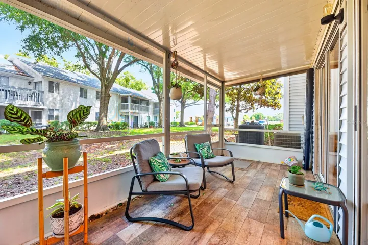 The COVERED and ENCLOSED SCREENED PATIO creates the perfect indoor-outdoor retreat for relaxing mornings or peaceful evenings.