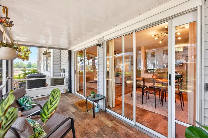 The COVERED and ENCLOSED SCREENED PATIO creates the perfect indoor-outdoor retreat for relaxing mornings or peaceful evenings.