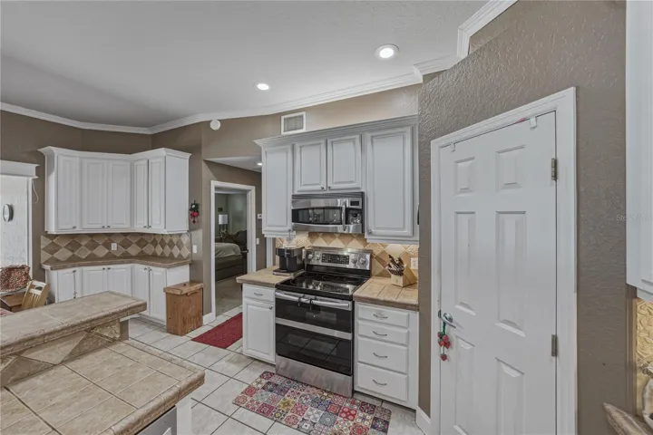 The kitchen cabinetry features 42