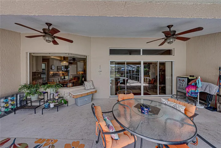 The covered lanai has 2 ceiling fans with lights.