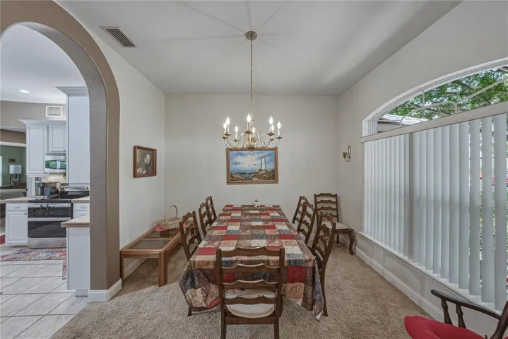 The double window in the dining room brightens this space.