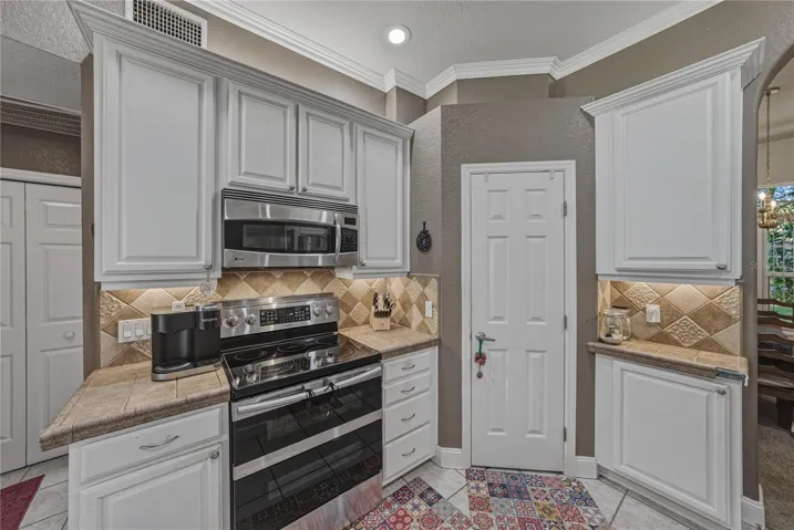 The walk-in pantry fills the corner of the kitchen.