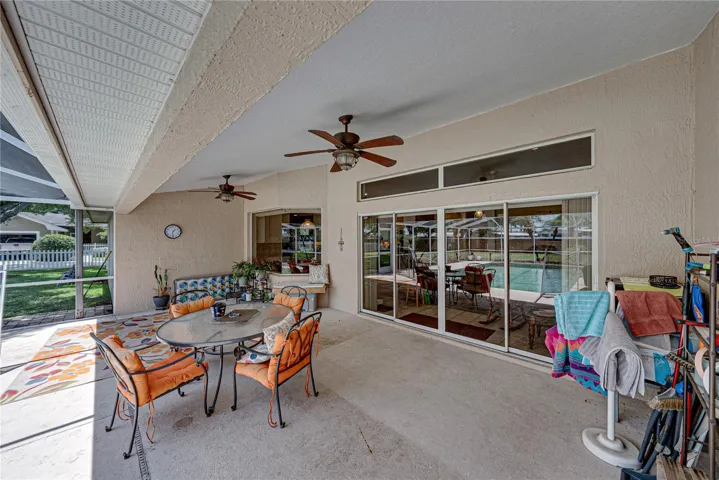 The large, covered portion of the pool area provides a shaded area.