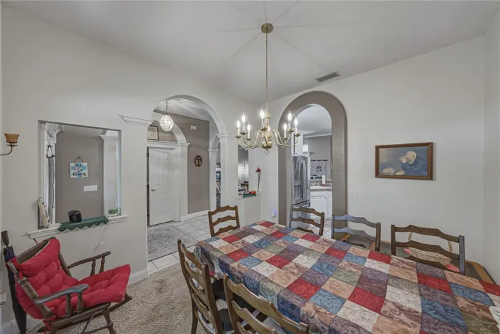 The dining room can be accessed from the foyer and the kitchen.