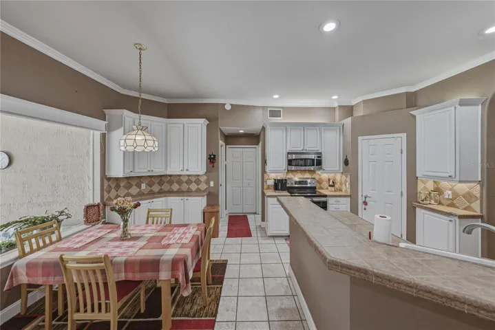 Another pantry/utility closet is in the background.
