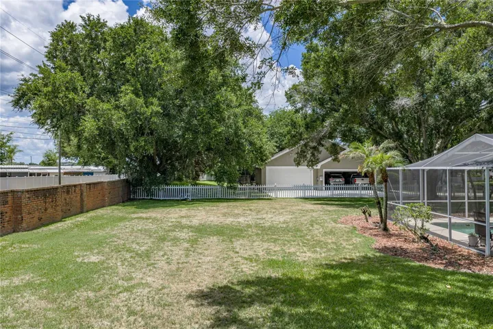 The large, fenced backyard will be enjoyed by the furry family member.