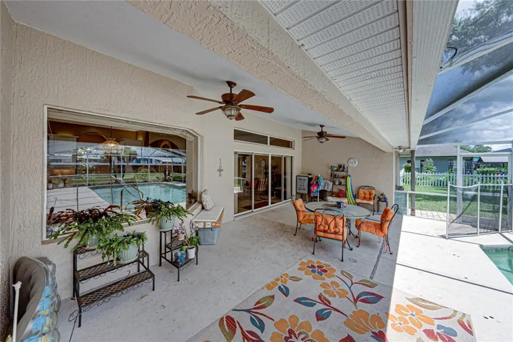 The covered lanai is great place to enjoy the famous Florida weather.