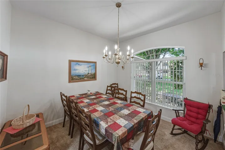 The dining room has upgraded carpeting.