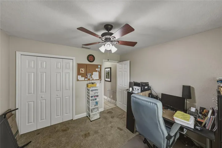 Bedroom 2 has a reach in closet. The guest bathroom is just down the hall.